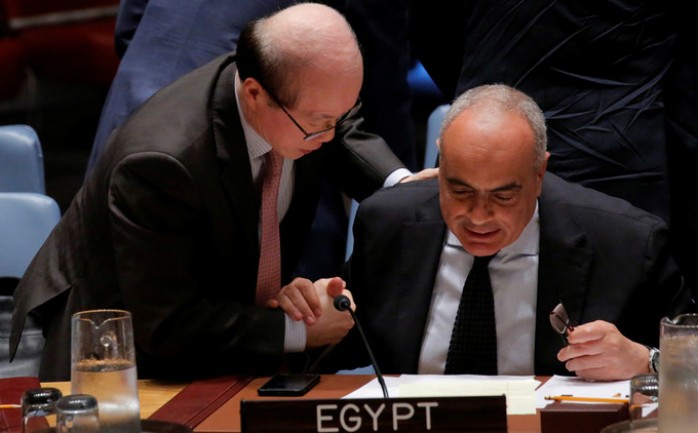 مندوبا مصر والصين في الأمم المتحدة أثناء اجتماع لمجلس الأمن الدولي