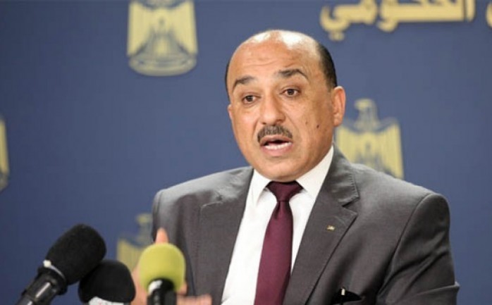 وزير الأشغال العامة والإسكان مفيد محمد الحساينة