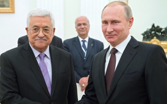 الرئيس الفلسطيني محمود عباس ونظيره الروسي فلاديمير بوتين