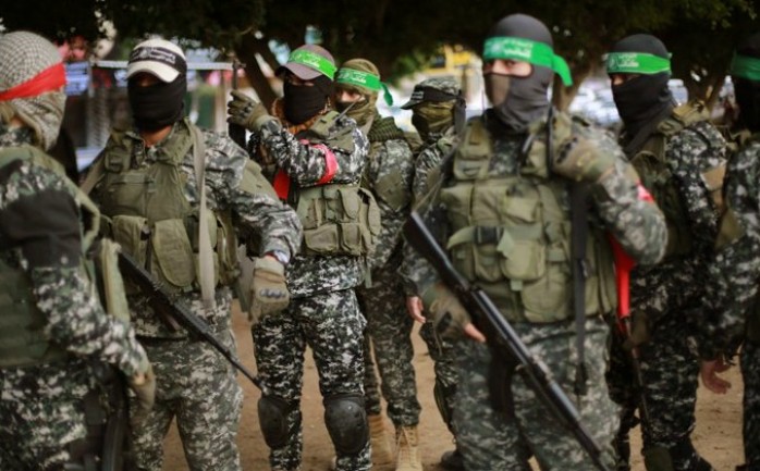 عناصر من المقاومة الفلسطينية في ساحة الجندي المجهول