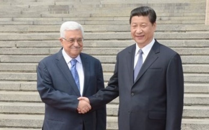 لقاء سابق بين الرئيس عباس ونظيره الصيني
