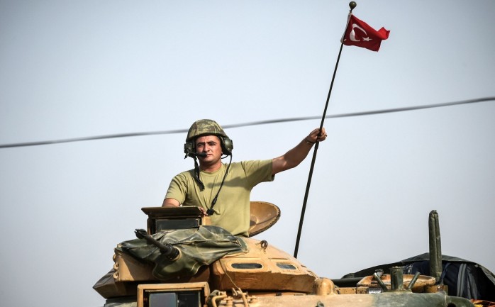 أحد عناصر الجيش التركي على الحدود السورية