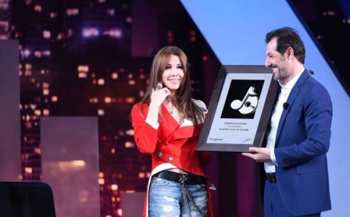 تحدثت الفنانة اللبنانية نانسي عجرم عن تجربتها بالموسم الأول من برنامج (The Voice Kids)، كاشفة عن حقيقة مشاركتها بالموسم الثاني.

وقالت نانسي التي حلت ضيفة على برنامج (هيدا حكي) مع الإعلامي 