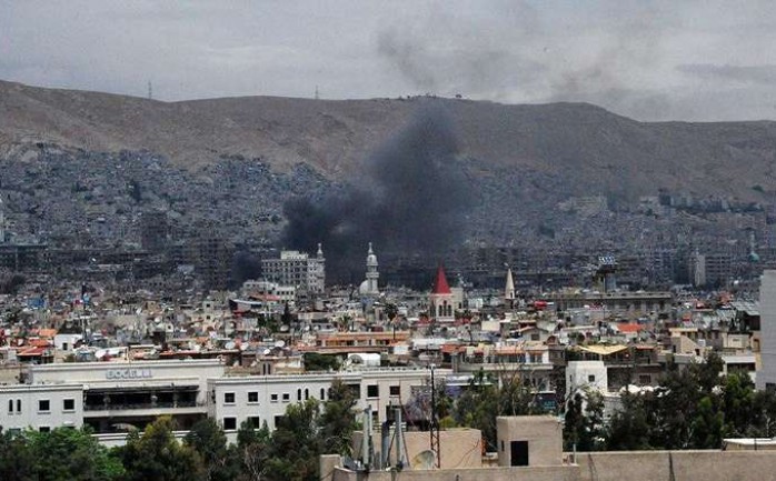 الدخان يتصاعد فوق منطقة المرجة في دمشق "وكالة سانا"
