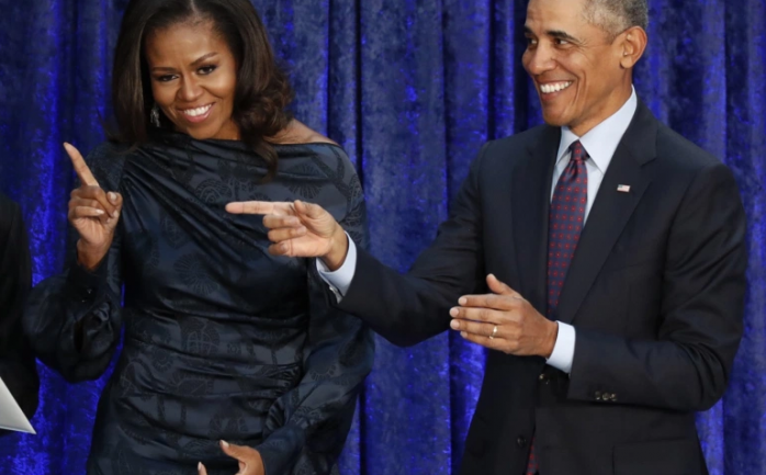 الرئيس الأمريكي السابق باراك أوباما وزوجته ميشيل أوباما